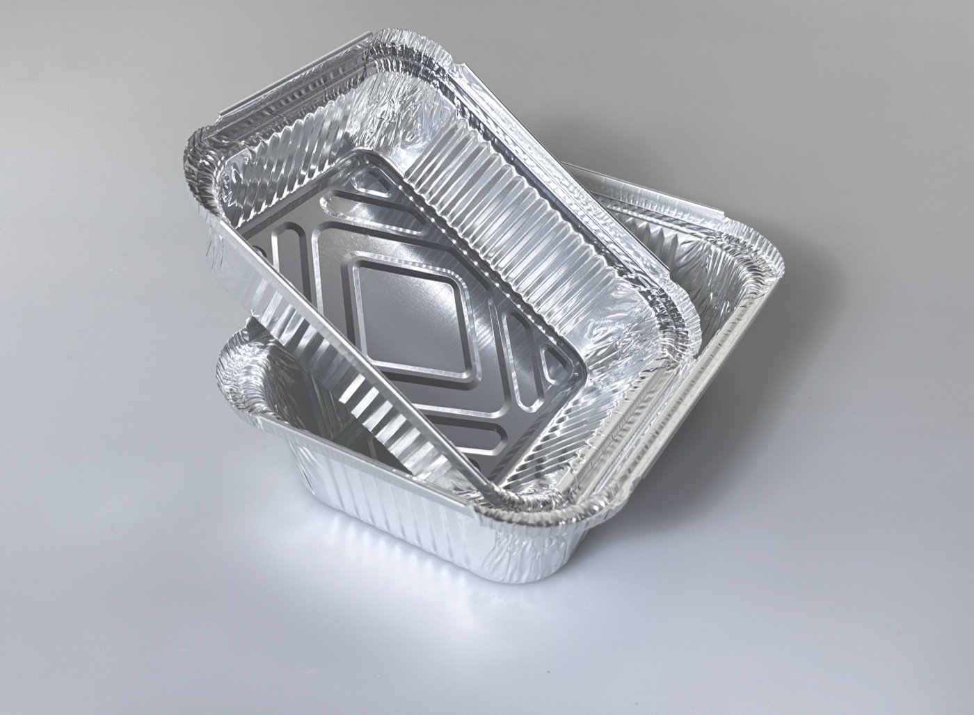 Open aluminum foil food container with lid
